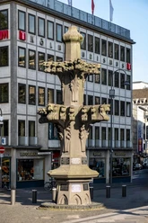 Finial Finial with elaborate decorations in front of the Cologne Tourist Board.