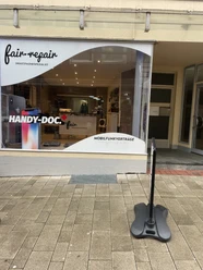 Das Bild zeigt den Eingangsbereich des Geschäfts Fair Repair
