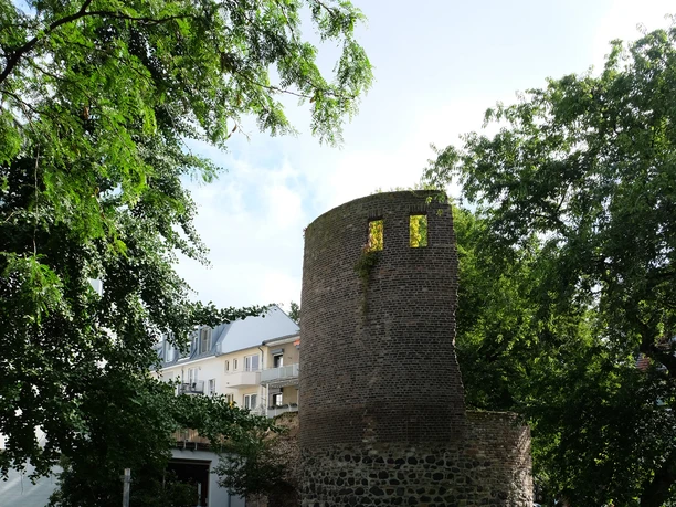 Helenenturm The Helenenturm, a Roman building tower made of quarry stone, surrounded by trees and green spaces.