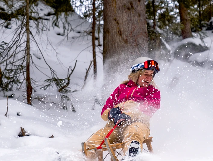 Faire de la luge Schlitteln