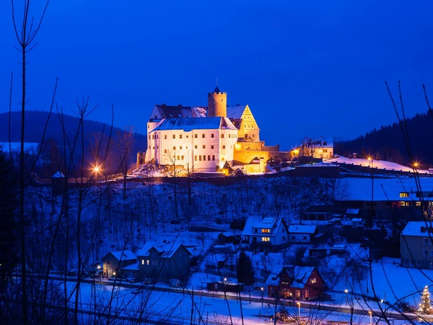 Burg Scharfenstein im Winter am Abend