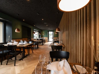 The parlour, with kitchen and bar - the heart of the Lindenhof