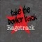 Graffiti-Schriftzug auf grauer Wand mit rotem Kreuz und Text "take the power back Rageback".
