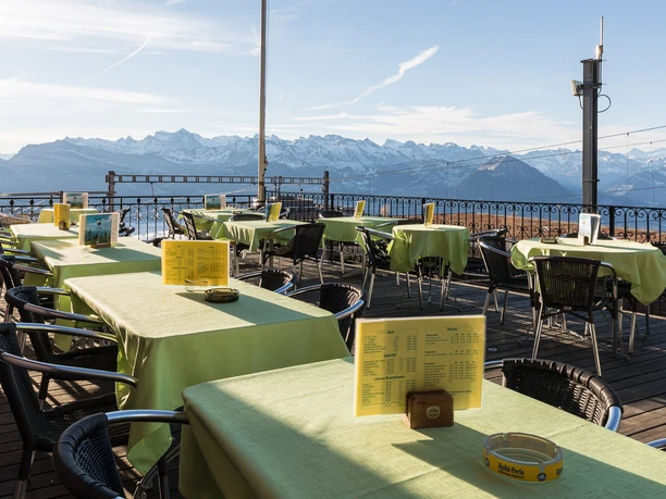 Restaurant Hotel Alpina Outdoor terrace with a view of the mountains