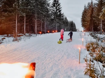 Rodeln im Feuerschein Schierke
