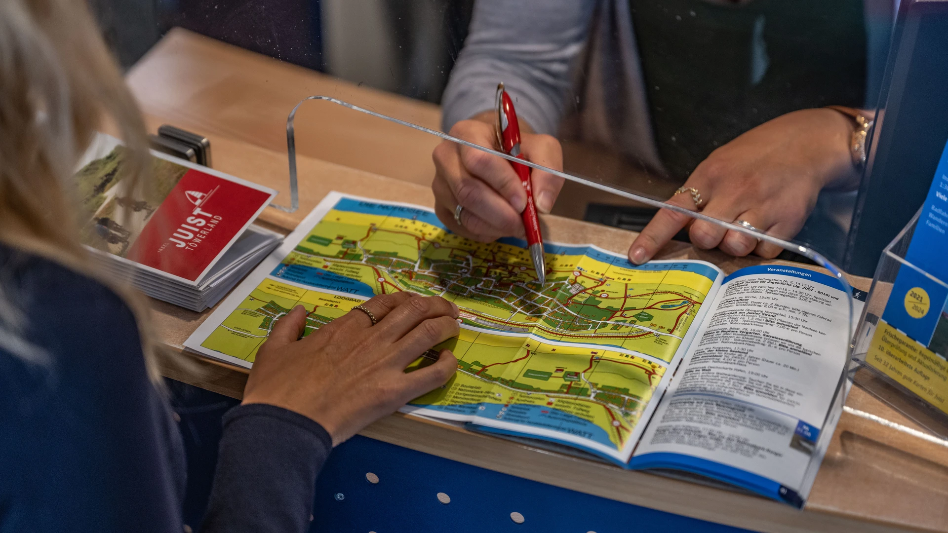 Leistung des Gästebeitrags auf Juist: Strandlooper und Infoheft