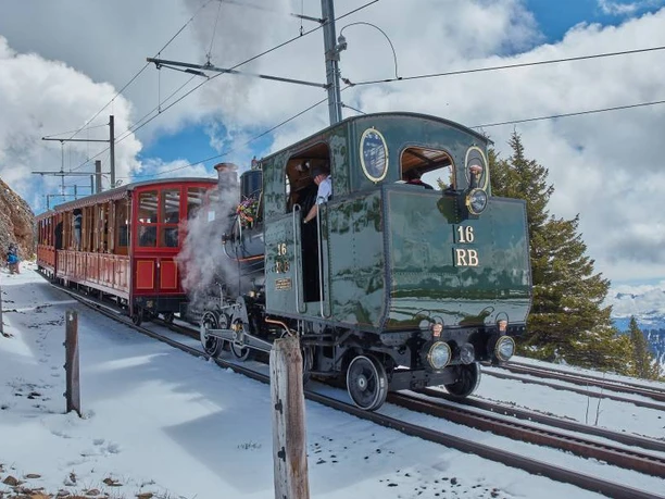 Rigi winter steamboat trip Steam locomotive travels up the Rigi