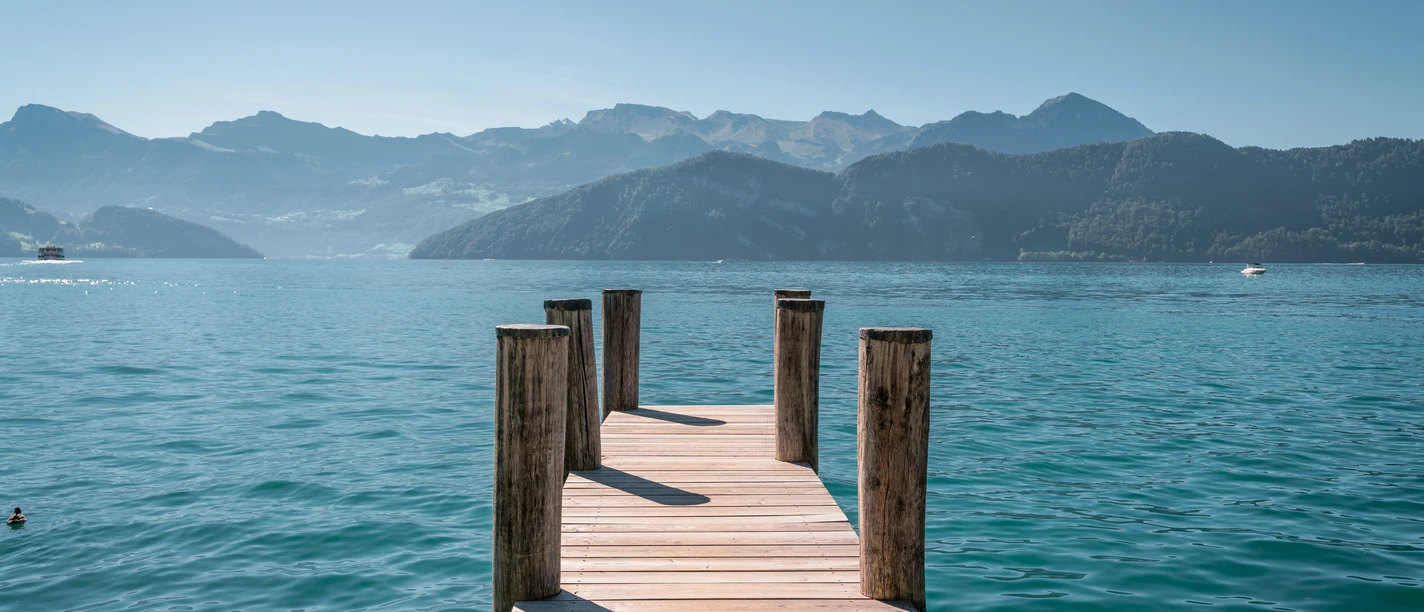 Bootssteg Oberdorfquai Aussicht vom Oberdorfquai in die Berge