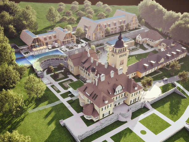 Luftbild der geplanten Anlage Luftaufnahme eines großen Schlosskomplexes mit Nebengebäuden, Pool und umliegenden Gärten im Grünen.