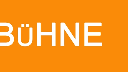 Bühne.jpg Orangefarbener Hintergrund mit dem weißen Schriftzug "BÜHNE" in Großbuchstaben.