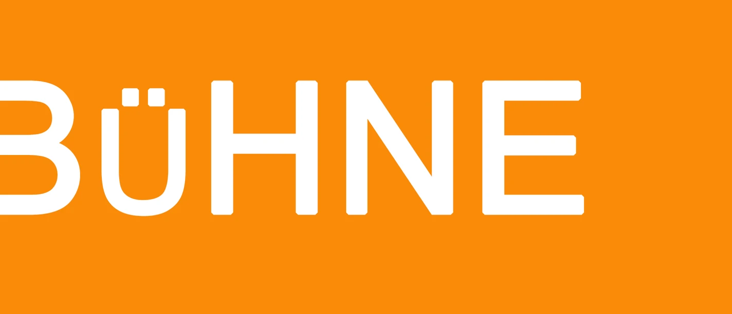 Bühne.jpg Orangefarbener Hintergrund mit dem weißen Schriftzug "BÜHNE" in Großbuchstaben.