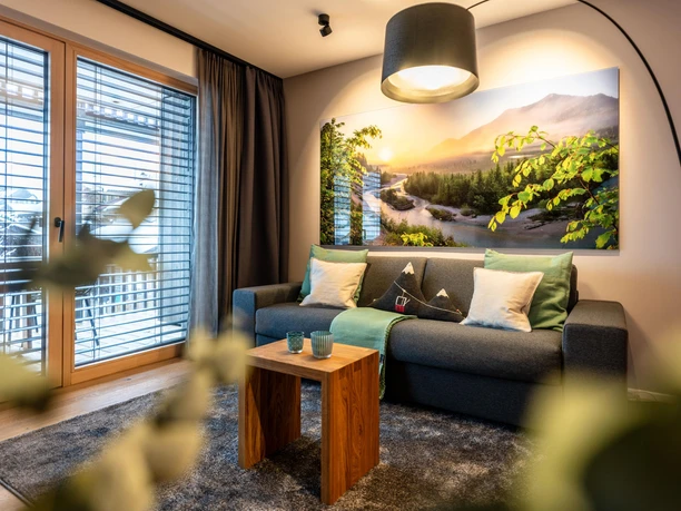 Wohnzimmer mit Schlafsofa