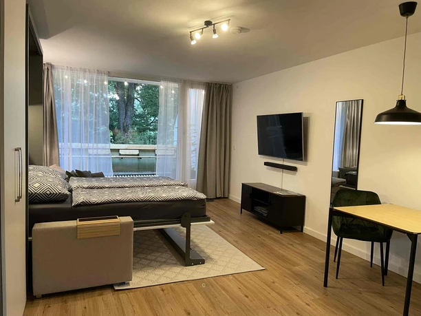 Ferienwohnung Heini in Sankt Andreasberg - Wohnbereich mit Schrankbett