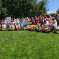 Teamevent.jpg Group photo at the team event on the lawn with self-made go-kart cars