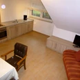 Ralf_hachmann.jpg Ferienwohnung mit moderner Küchenzeile, Esstisch, gemütlicher Sitzecke und Flachbildfernseher.