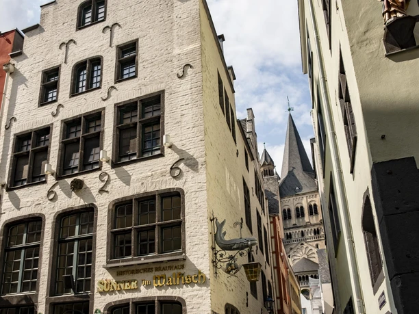 Cologne old town Historic building in Cologne's old town with the lettering "Sünner im Walfisch".