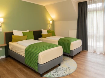 Doppelzimmer mit getrennten Betten
