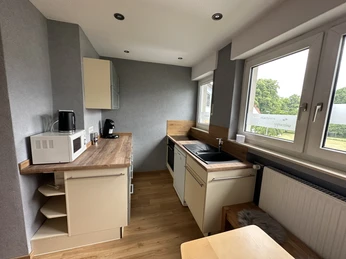 Blick in die Küche in der Ferienwohnung Drifte Blick in die Küche in der Ferienwohnung Drifte