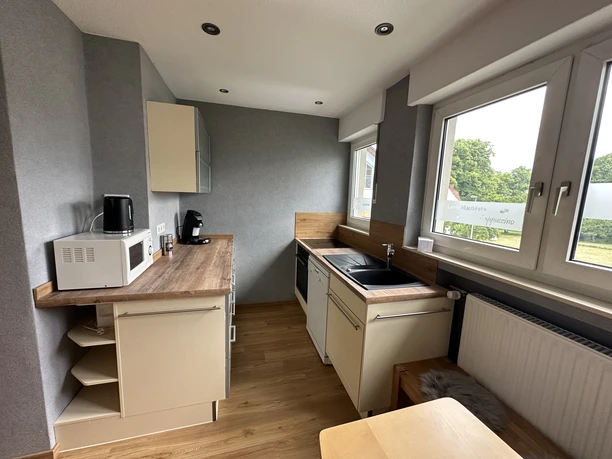 Blick in die Küche in der Ferienwohnung Drifte Blick in die Küche in der Ferienwohnung Drifte