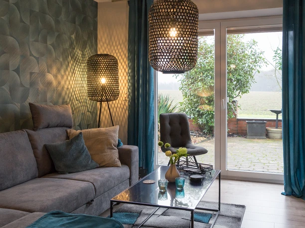 Wohnzimmer mit Blick ins Grüne Wohnzimmer mit Blick ins Grüne