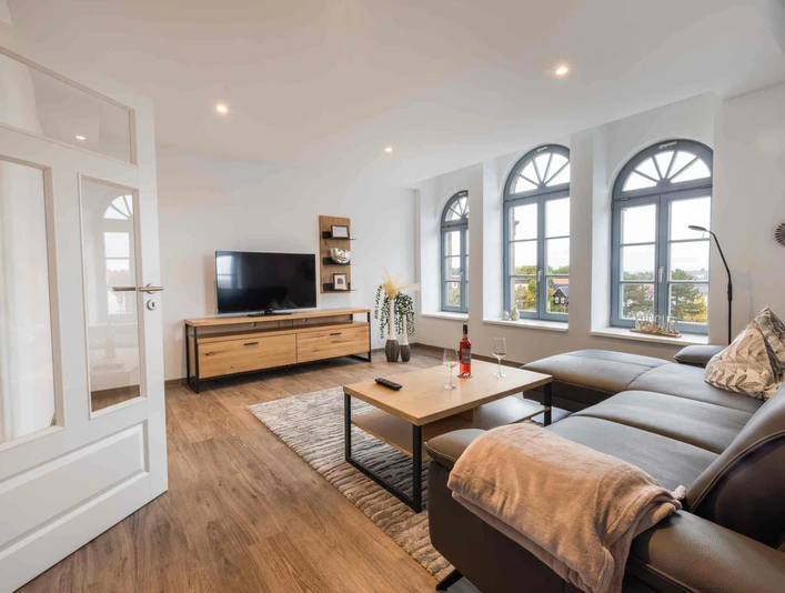 Appartement Bahn - Appartements Bett und Bike in Seesen - Wohnzimmer Appartement Bahn - Appartements Bett und Bike in Seesen - Wohnzimmer