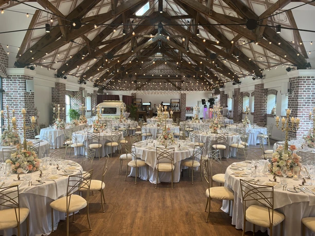 IMG_0720.jpg Event barn with and fairy lights on the ceiling and festively decorated banquet tables