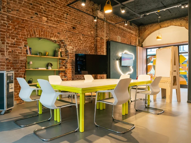 Panorama2.jpg Modern meeting room with brick wall, block seating,