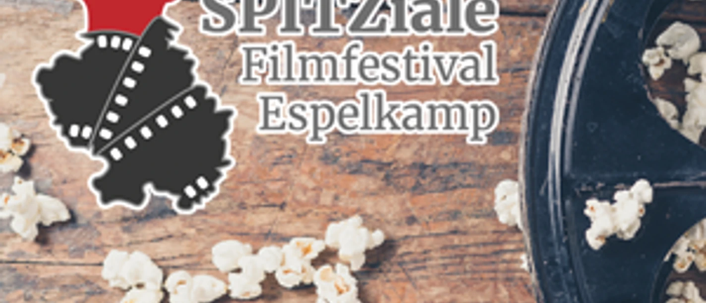 2862_295_1_g.PNG Popcorn auf Holztisch neben schwarzer Filmrolle, daneben Logo des Spitziale Filmfestivals Espelkamp.