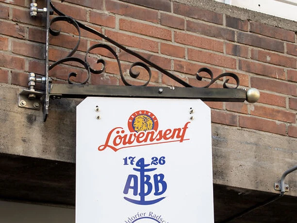 Löwensenf Schild