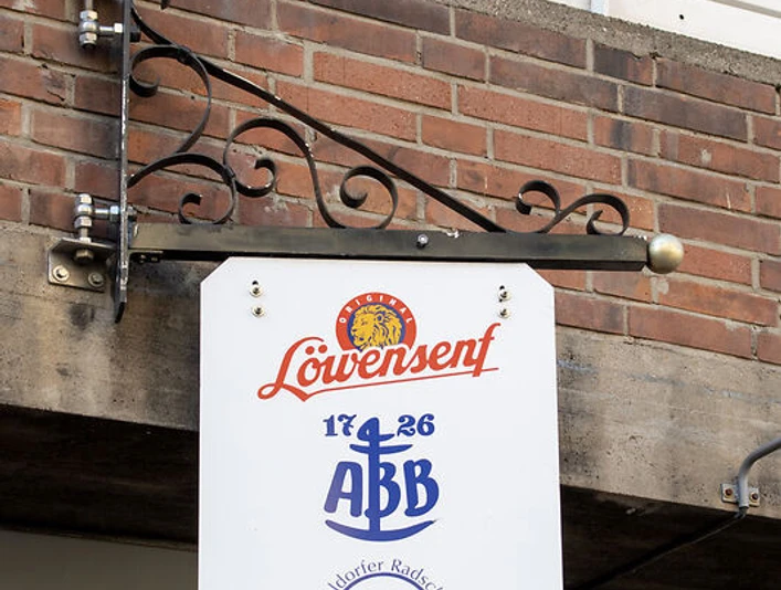 Löwensenf Schild