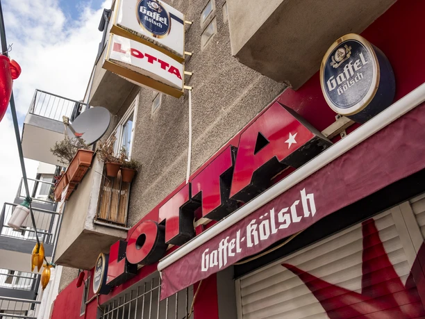 Lotta Bar View of the exterior façade and the bar sign.