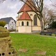 Dattelner Runde, Datteln Kapelle in Datteln mit Fachwerkhäusern und einem grünen Park im Vordergrund. Ruhe und Idylle.