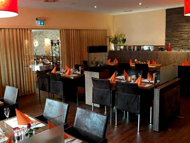 Sitzbereich im Restaurant zum Hollengrund in Heeslingen Sitzbereich im Restaurant zum Hollengrund in Heeslingen