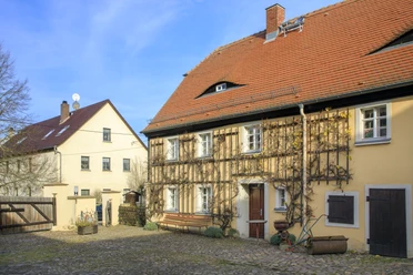 Le centre d'information touristique pour la lande de Dahlen est situé dans le musée de la ferme de Schmannewitz.