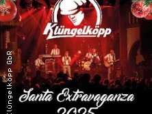 Die Santa Extravaganza 2025 mit der Band Klüngelköpp auf einer festlich beleuchteten Bühne.