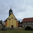 Kirche mit Friedhof in Endschütz