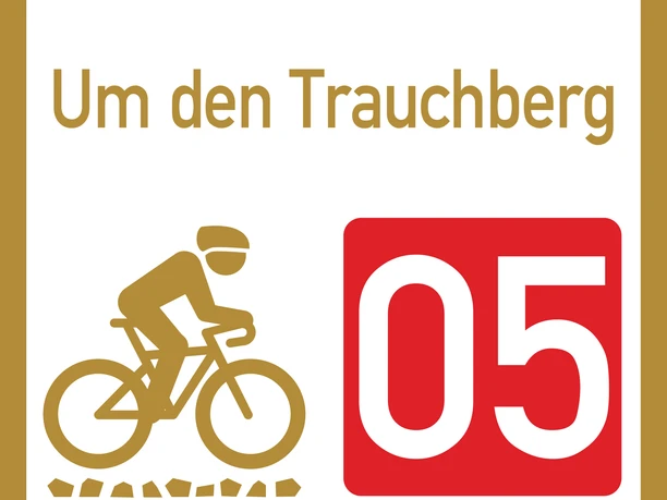 Wegweiser Graveltour Um den Trauchberg Wegweiser zur Graveltour "Um den Trauchberg" mit Radfahrersymbol und Nummer 05.