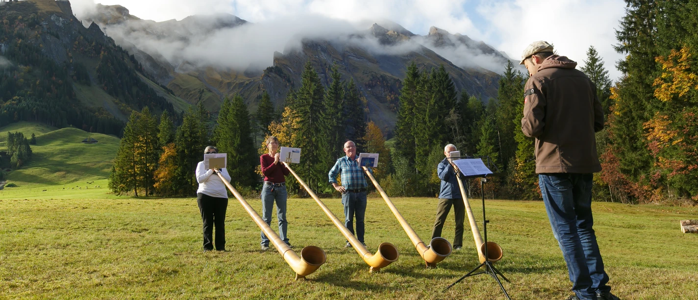 Playing the alphorn