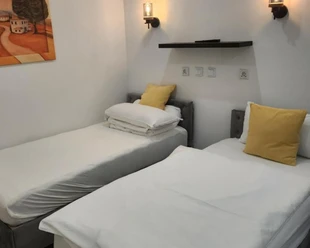 Slaapkamer in Pension Peking