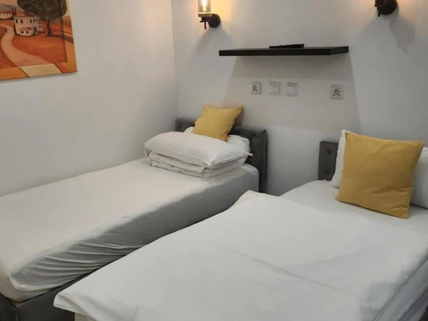 Restaurant und Pension Peking_Schlafzimmer Schlafzimmer in der Pension Peking