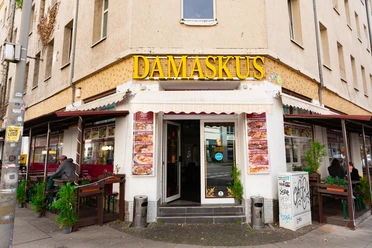 "Damascus" is written in large letters at the entrance to the restaurant