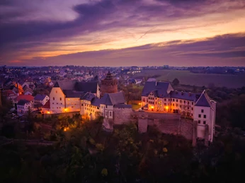 Burg Mildenstein - Sehenswürdigkeiten in der Leipzig Region Die Burg Mildenstein bei Leisnig erhebt sich hoch über der Mulde zum Sonnenuntergang
