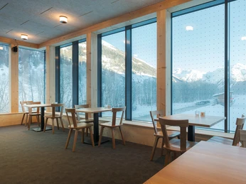 Coin salon au bistrot du centre nordique de Conches Sitzecke im Bistro des Nordischen Zentrums GomsSeating area in the bistro of the Nordic Centre GomsCoin salon dans le bistrot du centre nordique de Conches