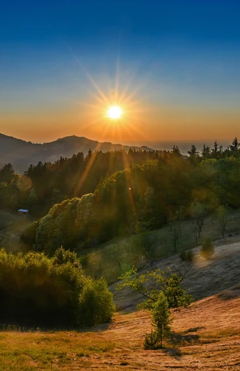 Blick vom Blöchereck ins Tal bei Sonnenuntergang