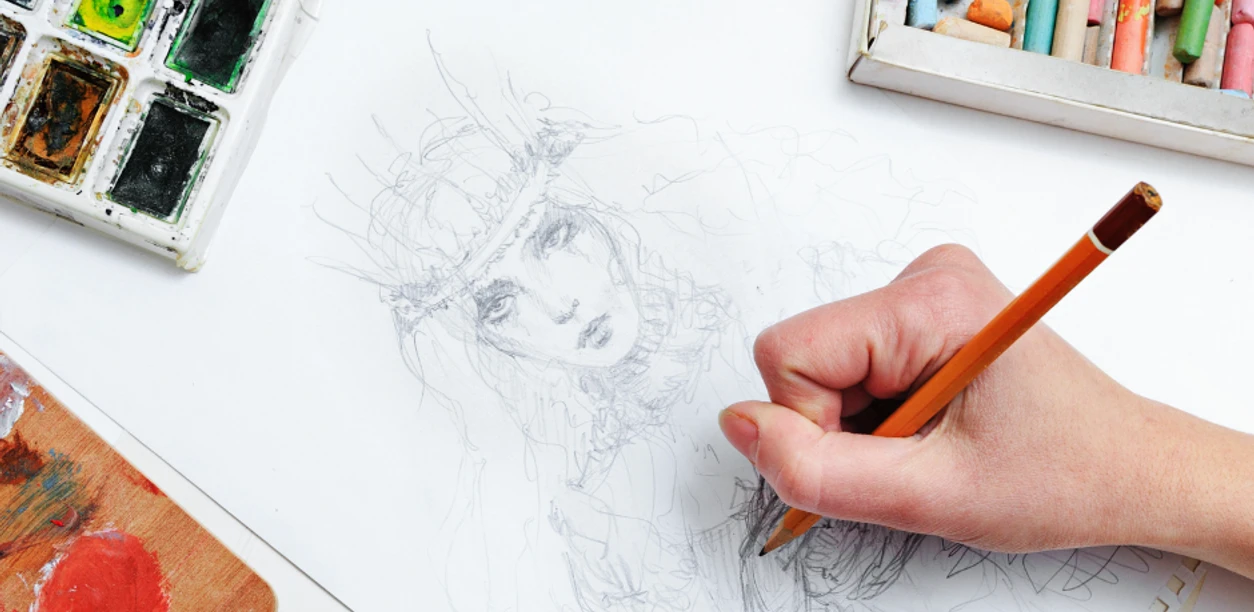 Zeichen-Workshop Eine Hand zeichnet mit einem Bleistift ein detailliertes Porträt auf einem weißen Blatt Papier.
