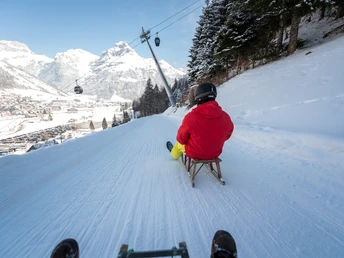 Schlitteln Gerschnialp