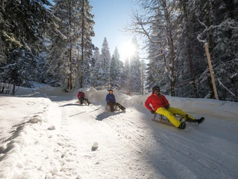Schlitteln Gerschnialp