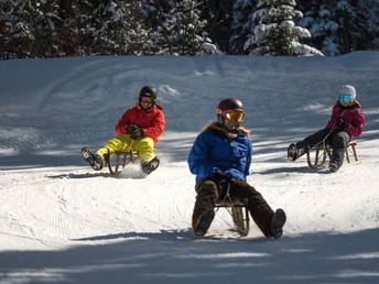 Schlitteln Gerschnialp