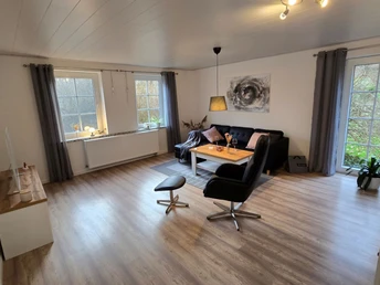 2-wohnzimmer-ferienwohnung-streckhofidylle-kudlek.jpg Wohnzimmer Ferienwohnung Streckhofidylle