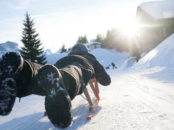 Take the sledge from Marbachegg down the valley run to Marbach